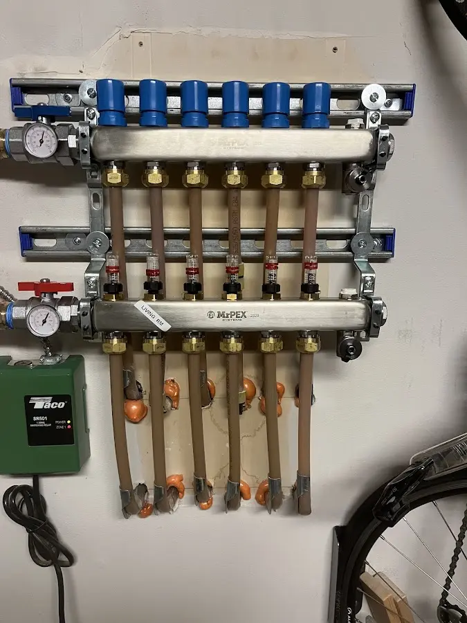 Plumber performing Water Heater Repair at a residential property in Unadilla